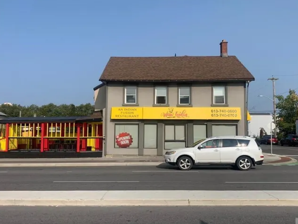143-159 Montreal Road, Ottawa — commercial buildings with storefronts and parking, located in a busy urban area.