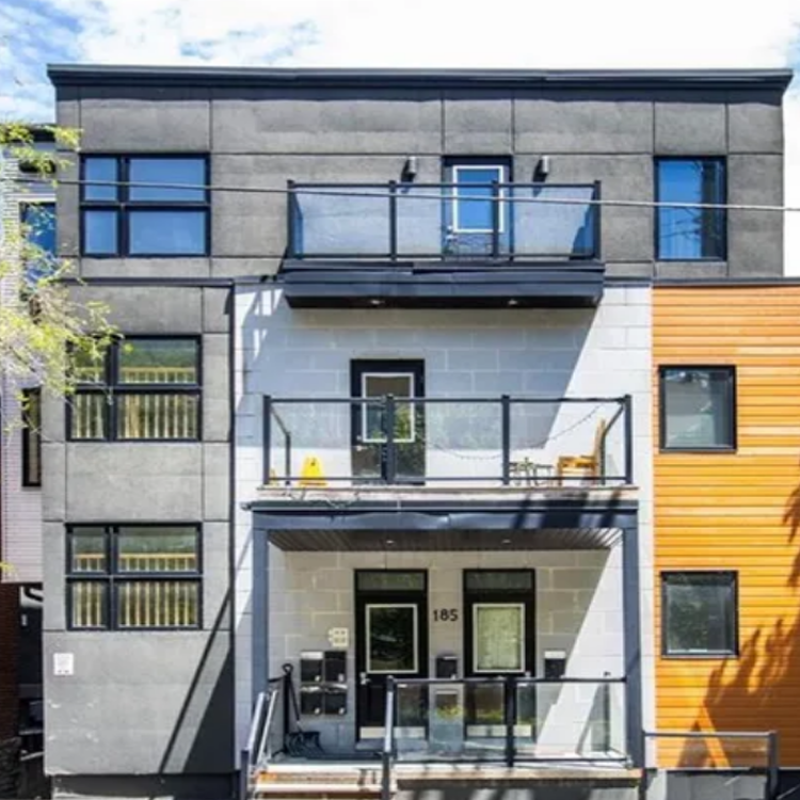 185 Henderson Avenue, Ottawa — red-brick multi-unit building with traditional architecture and front porch near downtown.