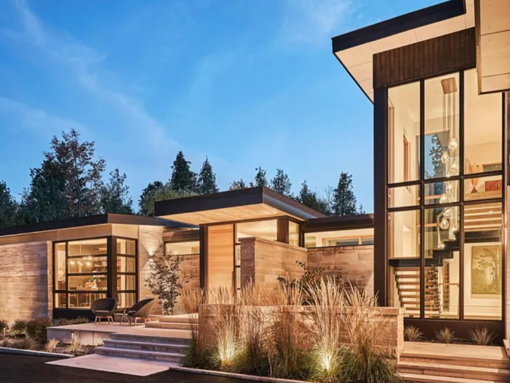 20 Kanata Rockeries, Ottawa — modern two-story detached home with stone and siding exterior, double garage, and landscaped front yard in Kanata.