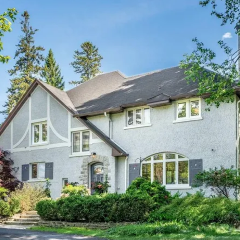 Elegant home at 224 Buena Vista Road, Ottawa, featuring a classic exterior, large front lawn, and mature trees.