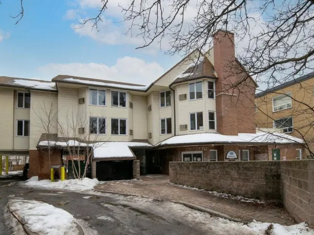 25 Rosemount Avenue, Ottawa — modern multi-unit residential building with a clean façade, ideally located near amenities and transit in a vibrant neighborhood.