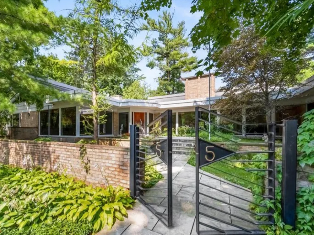 55 Willingdon Road, Ottawa — elegant residential property featuring a classic design, lush greenery, and located in a prestigious neighborhood.