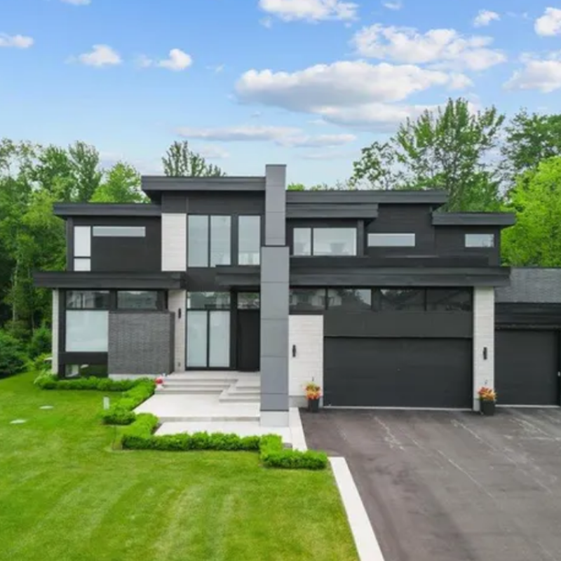 553 Shoreway Drive, Ottawa — modern two-storey home with double garage, stone and siding exterior, and manicured front lawn in a suburban setting.